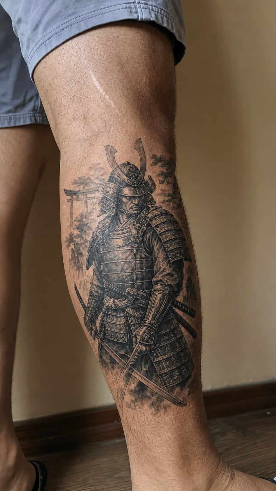 From Samurai to Dragons: 19 Stunning Japanese Tattoo Ideas for Men 3 Healed samurai warrior tattoo on a adult man's outer calf, photographed in a natural gentle side angle that clearly shows how the ink — study 2