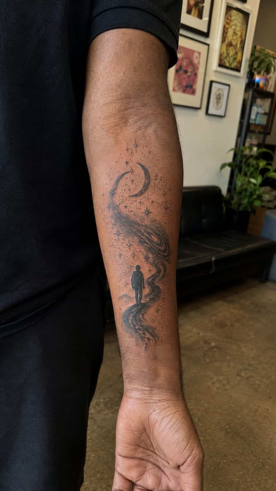 48 Tattoo Ideas for Men Worth Considering for Your Next Ink 6 Healed celestial wanderlust tattoo on a adult man's inner forearm, photographed in a natural casual close three-quarter view — study 1