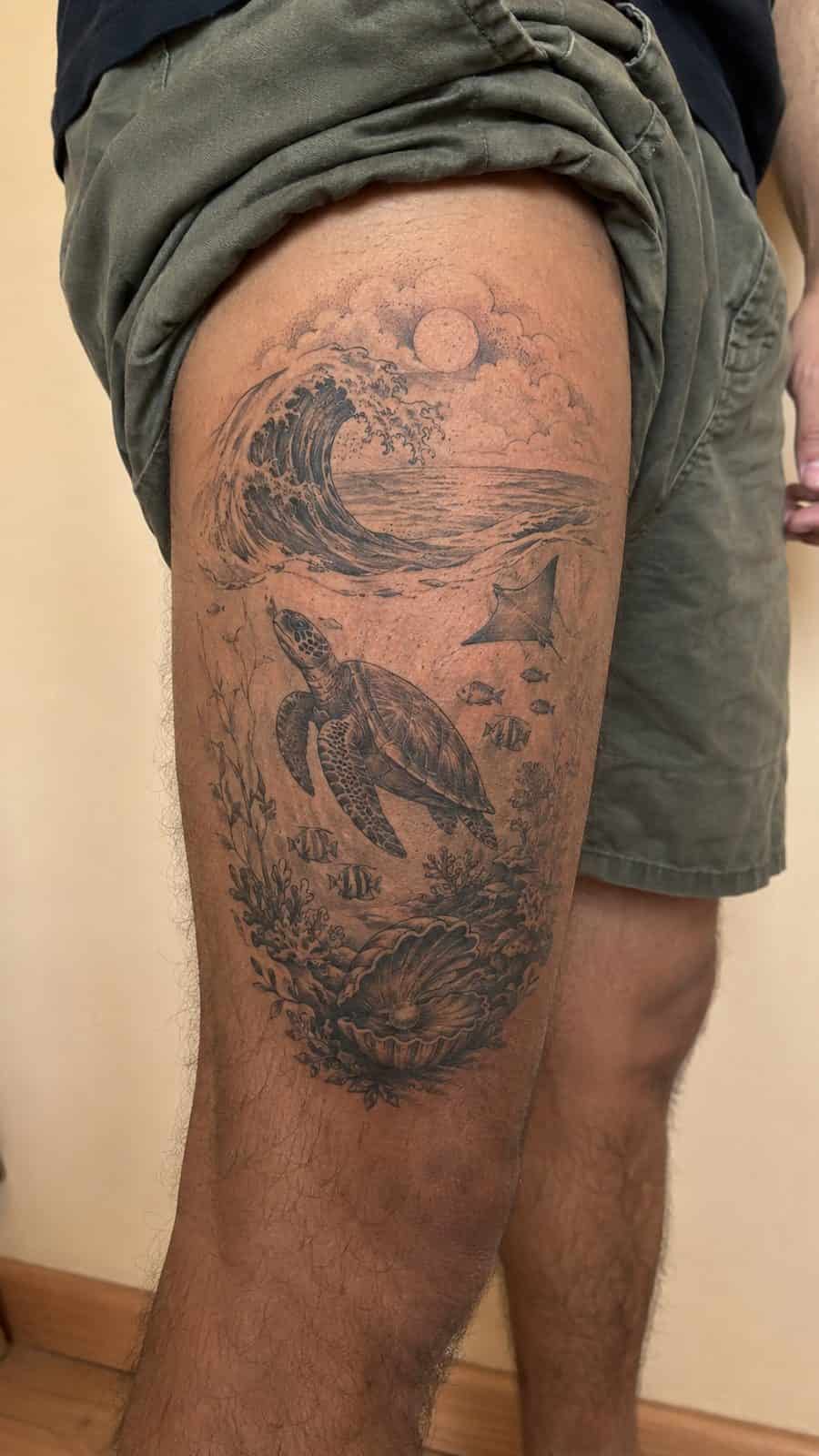 48 Tattoo Ideas for Men Worth Considering for Your Next Ink 19 Healed aquatic dreams tattoo on a adult man's outer thigh, photographed in a natural gentle side angle that clearly shows how the ink — study 1