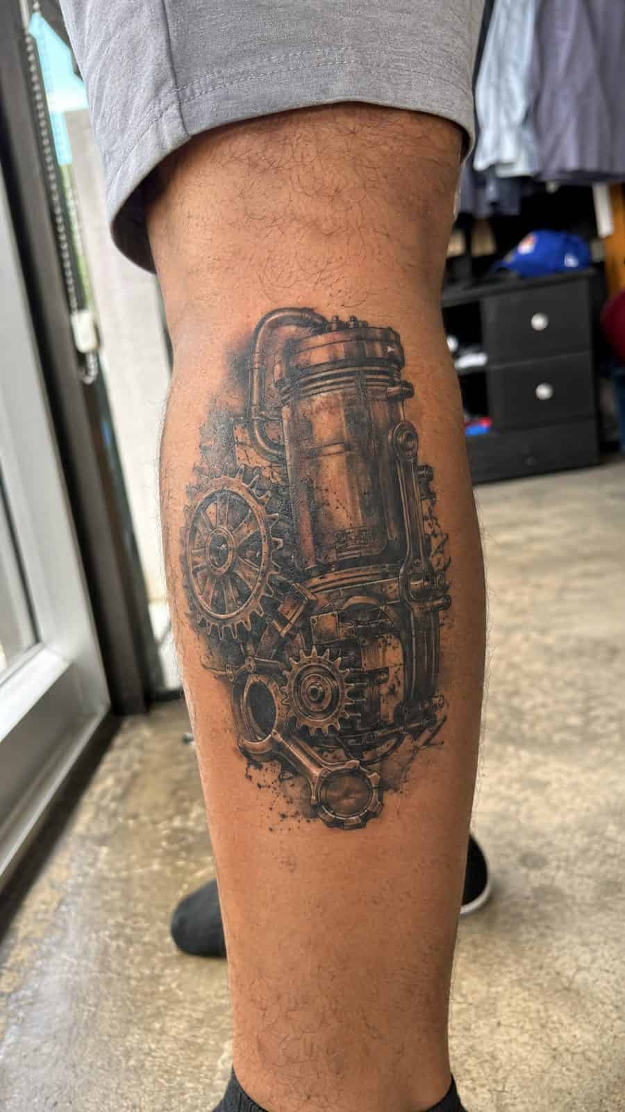 48 Tattoo Ideas for Men Worth Considering for Your Next Ink 33 Healed industrial grit tattoo on a adult man's outer calf, photographed in a natural waist-height candid close-up — study 2