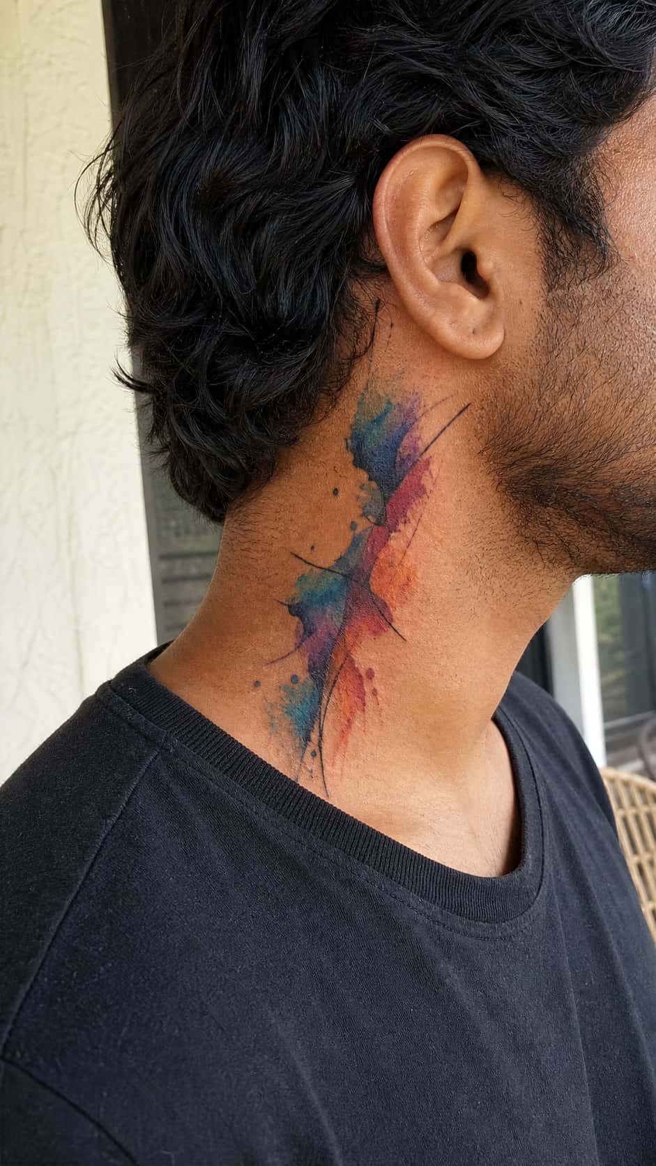 15 Neck Tattoo Ideas for Men Worth Considering 8 Healed abstract watercolors tattoo on a adult man's side neck, photographed in a natural gentle side angle that clearly shows how the — study 2