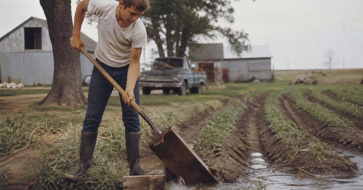 28 Things Every Farm Kid Could Do That City Kids Can't Imagine 11 Farm teenager managing irrigation water in the late 1960s