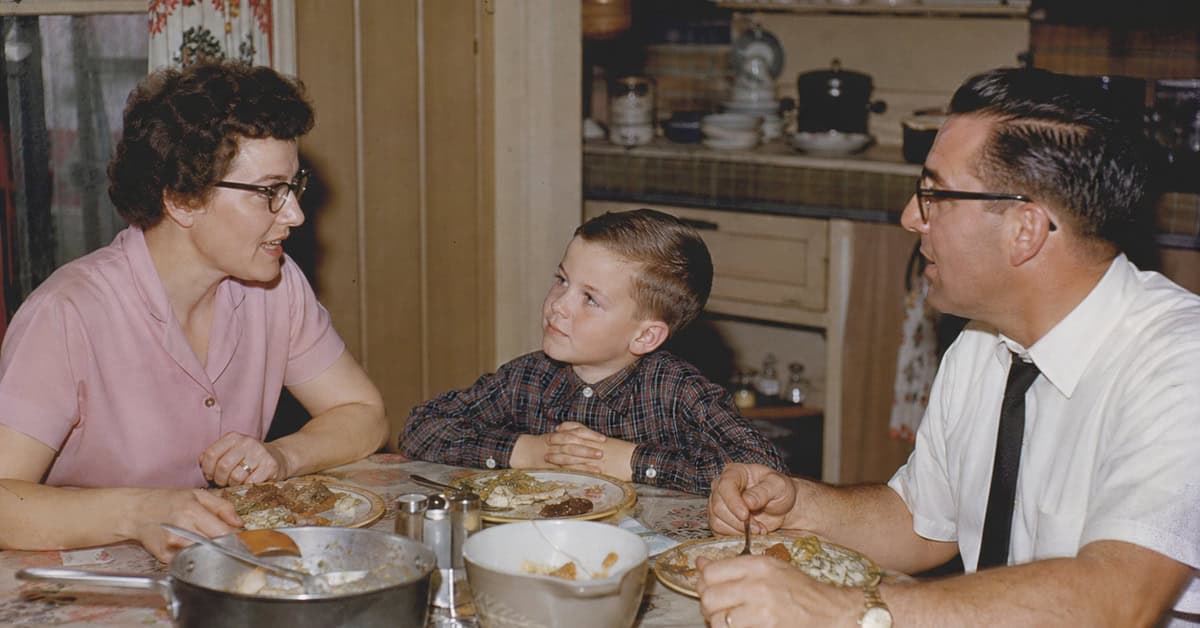15 Forgotten Manners That Made People Actually Like Each Other 6 Child listening without interrupting adults at a late-1950s dinner table