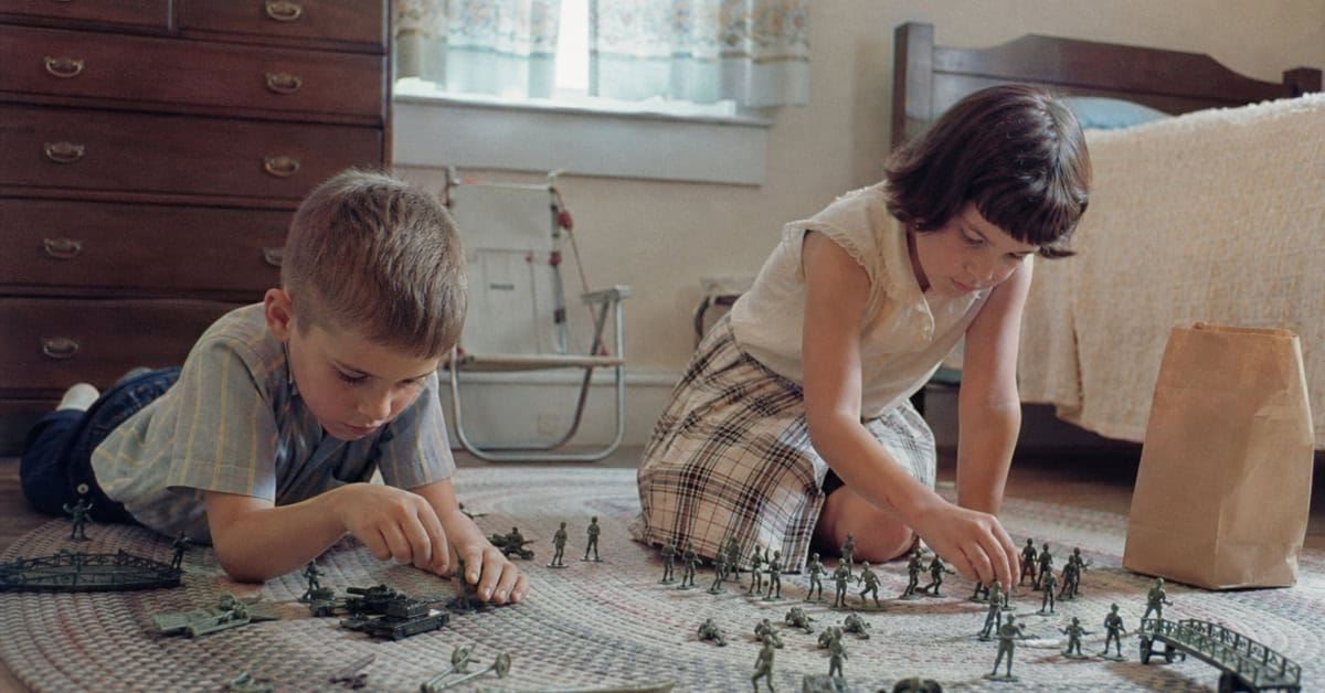 What You Could Actually Buy for Under a Dollar at the Toy Store 2 Children arranging plastic army figures on a bedroom rug in the 1960s