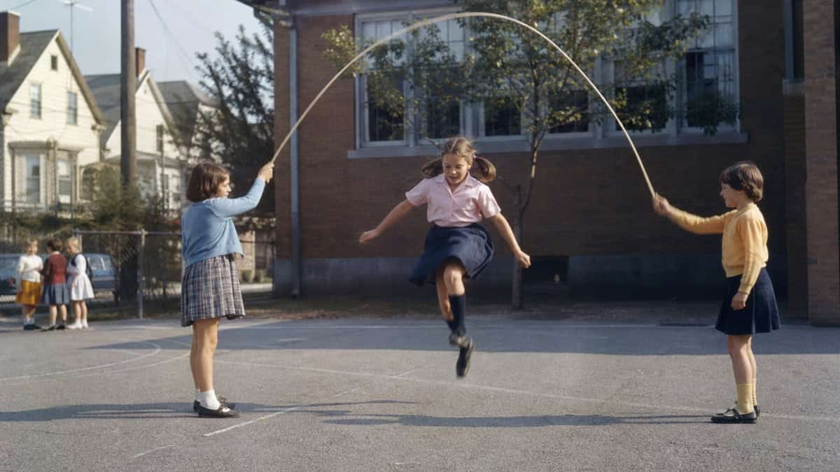 What You Could Actually Buy for Under a Dollar at the Toy Store 10 Children jumping rope on a school playground in the 1960s