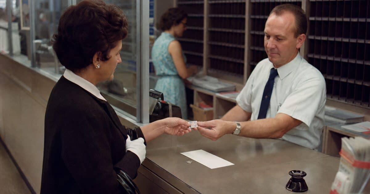 14 Things You Could Buy for a Nickel in 1960 (That Cost $20+ Now) 5 Customer buying a first-class postage stamp for a nickel in 1960