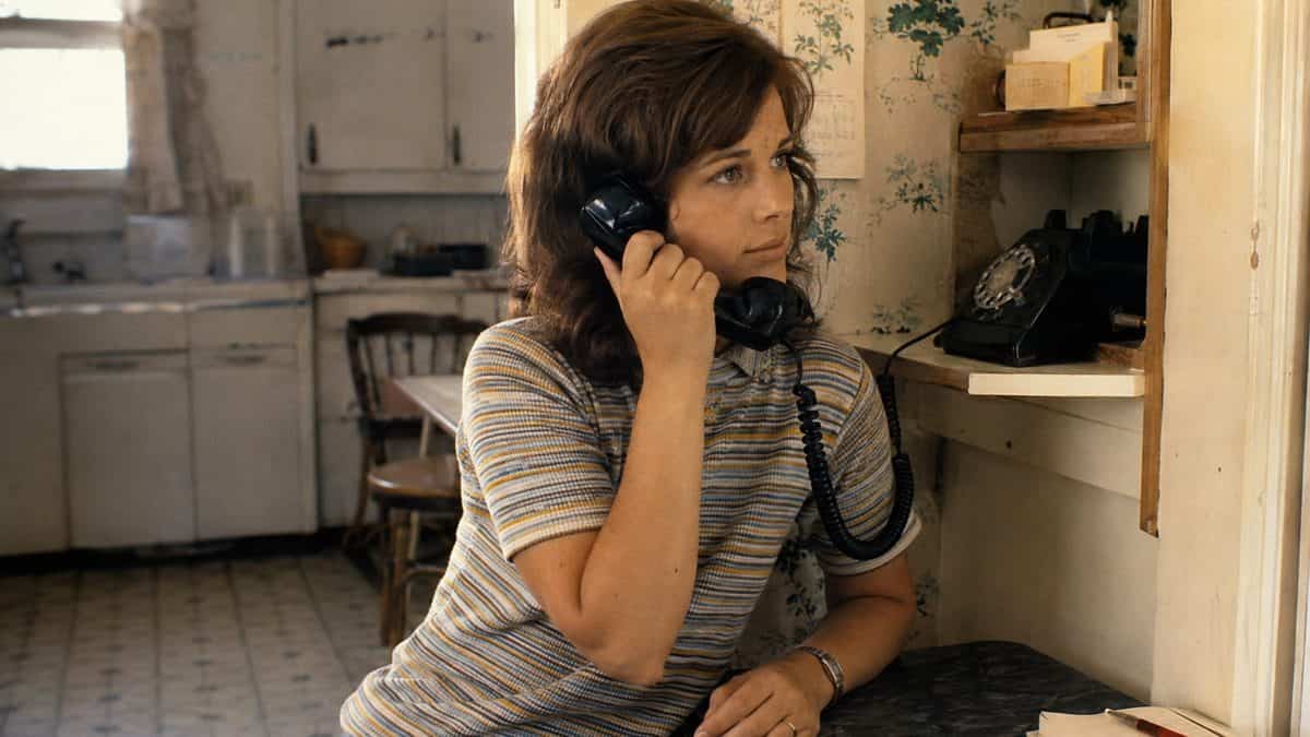 14 Things Every Kid Who Used a Rotary Phone Remembers 5 Authentic 1970s photo of woman using a single rotary phone