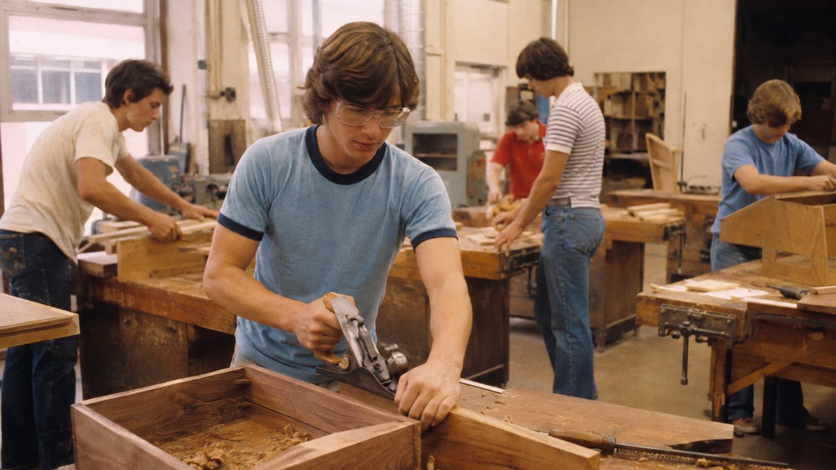 12 Required High School Classes That Disappeared 3 Students in a high school woodworking shop