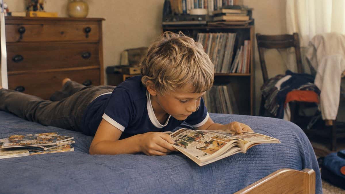 Child reading comics