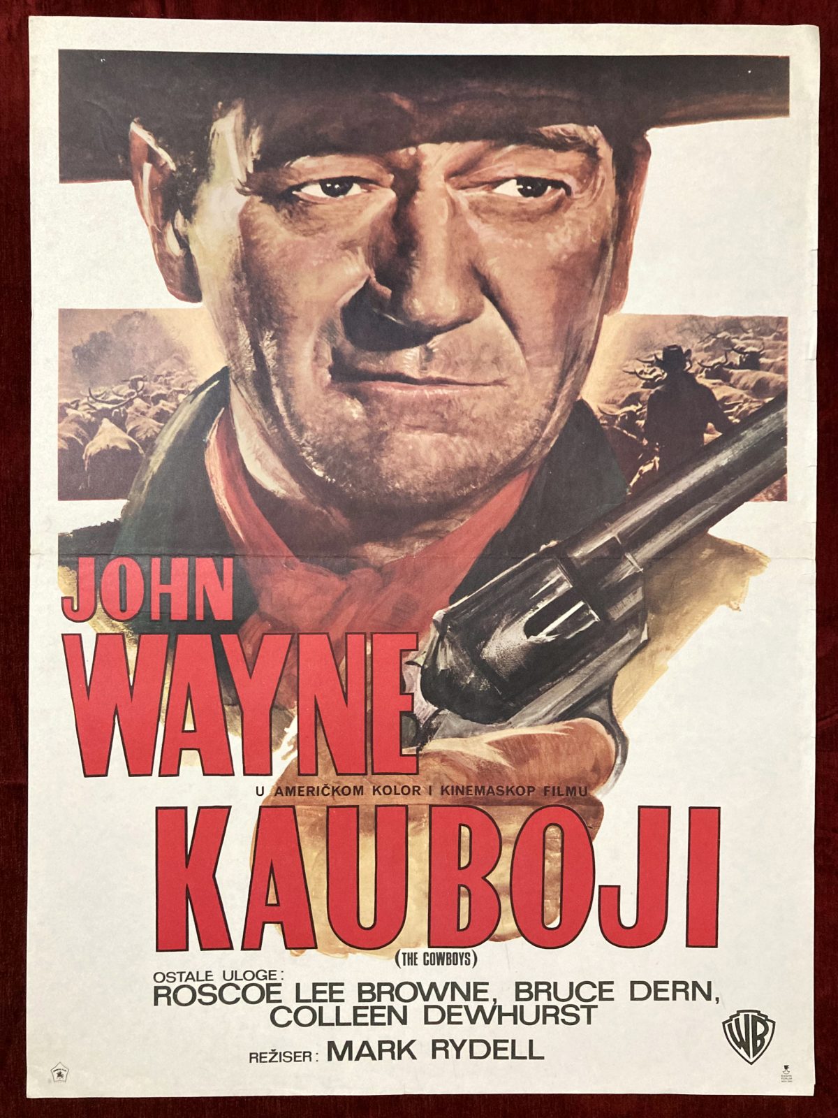 An original poster for the movie Cowboys starring John Wayne.