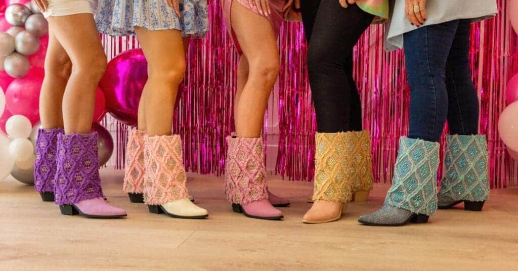 Models wearing SkyStruk Gram Glam Boots during the SkyStruk Celebration