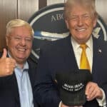 Trump Signs ‘Make Iran Great Again’ Hat as Iranians Flood Streets in Protests Against Islamic Regime