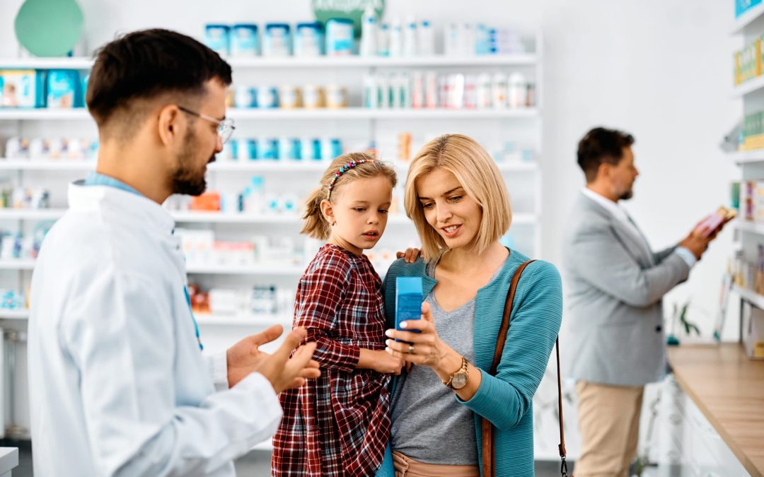 Mother getting help at pharmacy