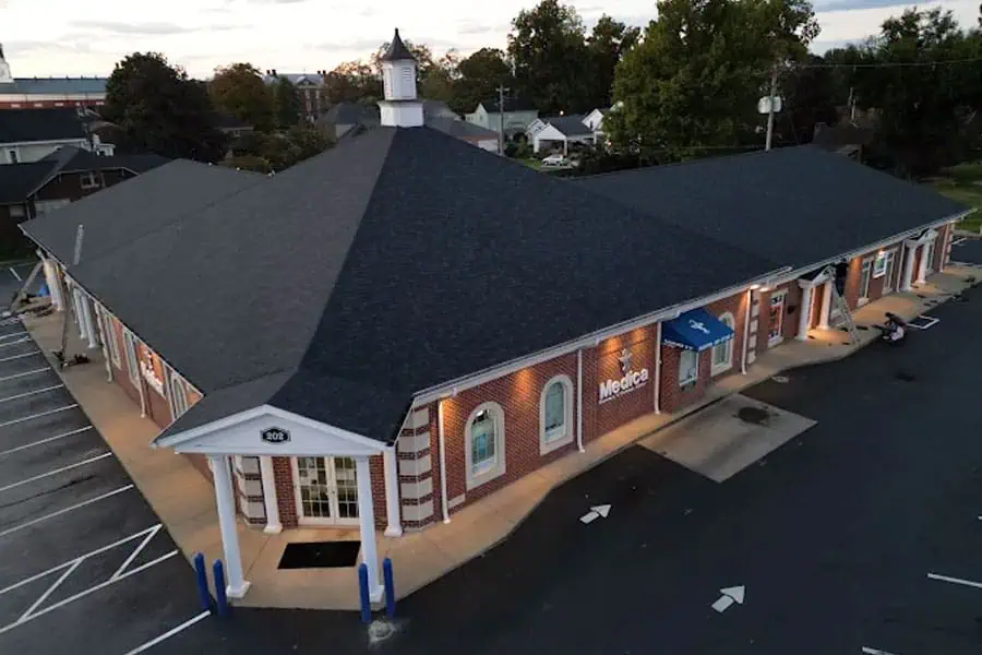 Commercial building with durable roofing and improved exterior appearance.