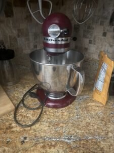 a kitchen aid mixer on counter in kitchen