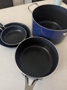 a cookware set on the countertop