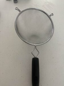 mesh strainer on counter