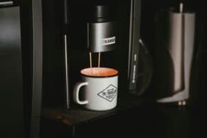 upclose super automatic espresso machine making a cup of coffee