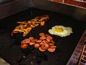 breakfast being made on griddle