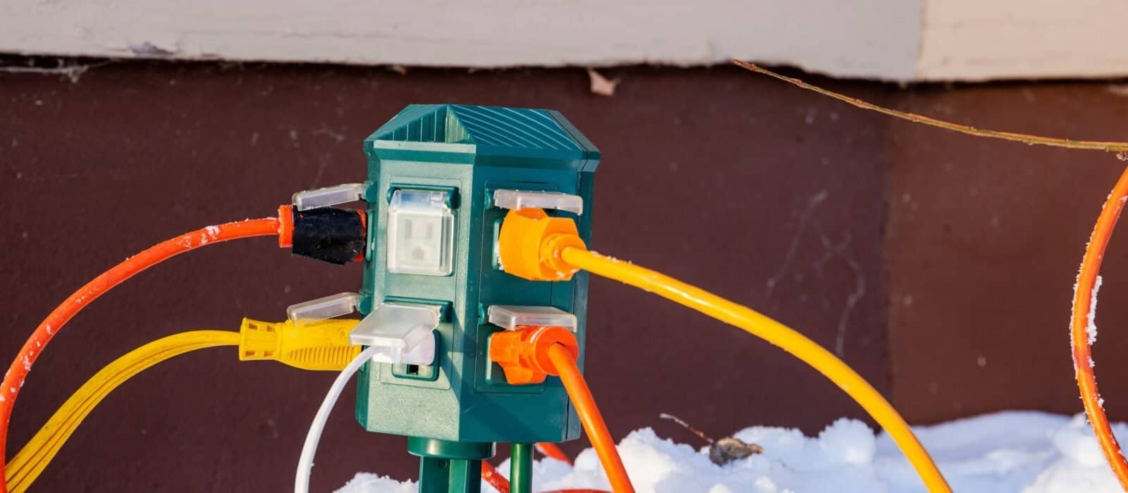 Best Outdoor Smart Outlets in 2026: Weather Ratings, Cold Tolerance, and Real Range