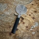 Best Pizza Cutters in 2026: Wheels, Rockers, and Easy-Clean
