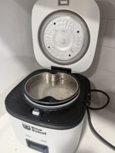 a rice cooker with steamer