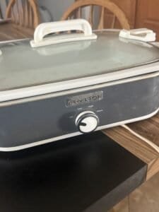 a slow cooker on kitchen counter