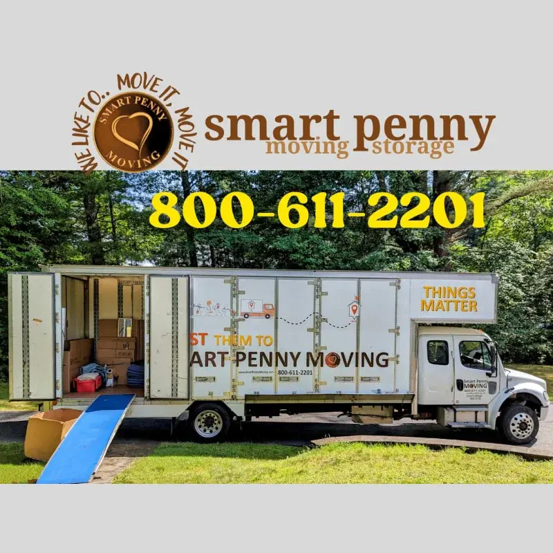 Smart Penny Moving truck parked with open doors, showcasing interior filled with boxes, ramp for loading, and contact information displayed prominently.