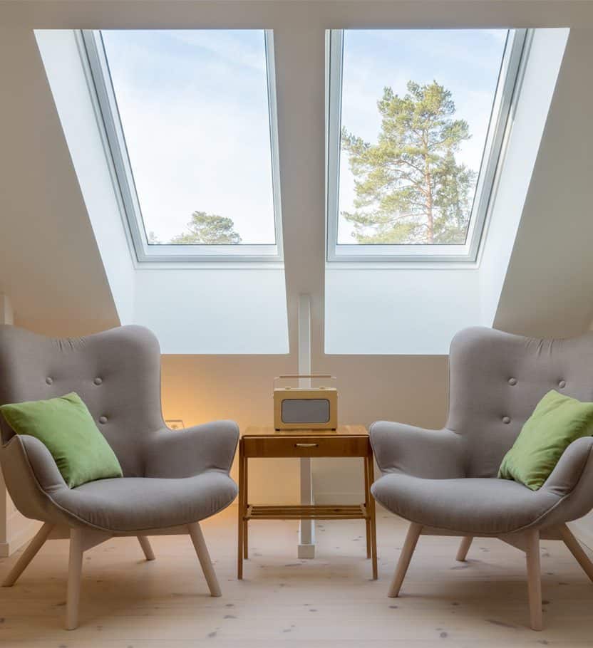 Two chairs under skylights