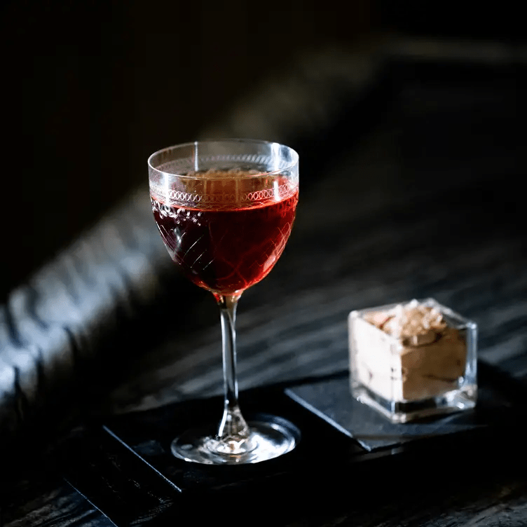 A drink served with a side dish at Tonic Bar, a women-led, alcohol-free bar in Saudi Arabia - (Credits Open Table)