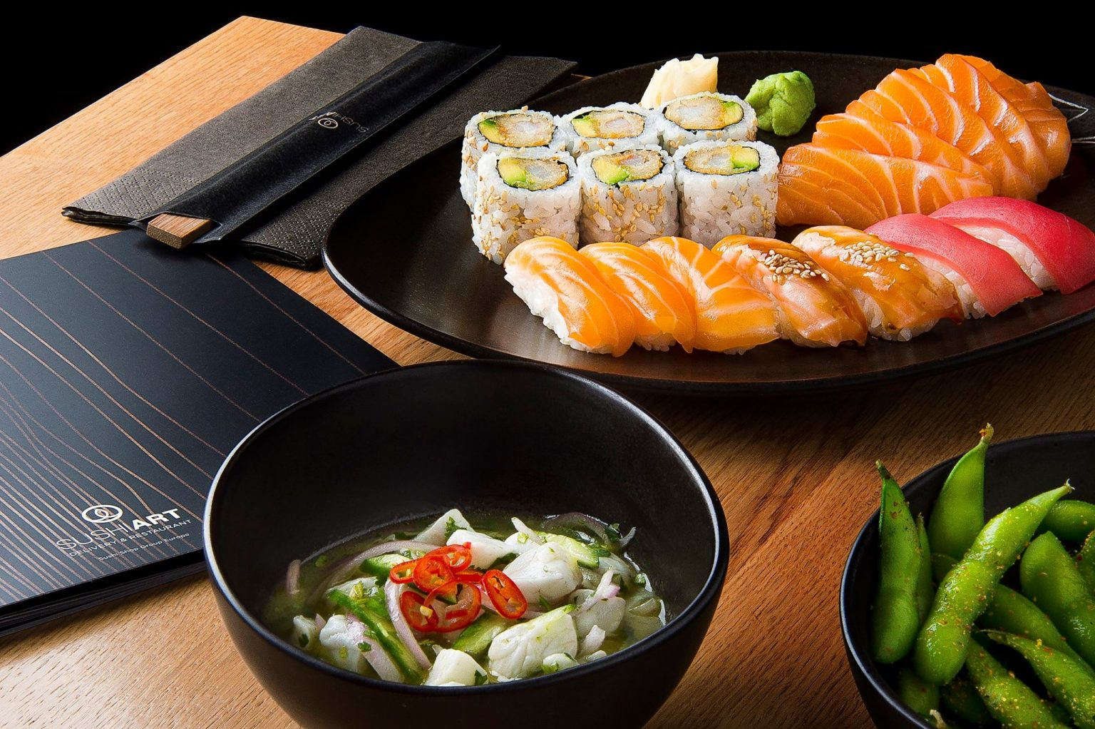 Enjoy a collection of appetizers like Edamame, Kani Salad, Shrimp Tempura, and Crispy Chicken bites to start you off. – (Credits: SushiArtRiyadh)