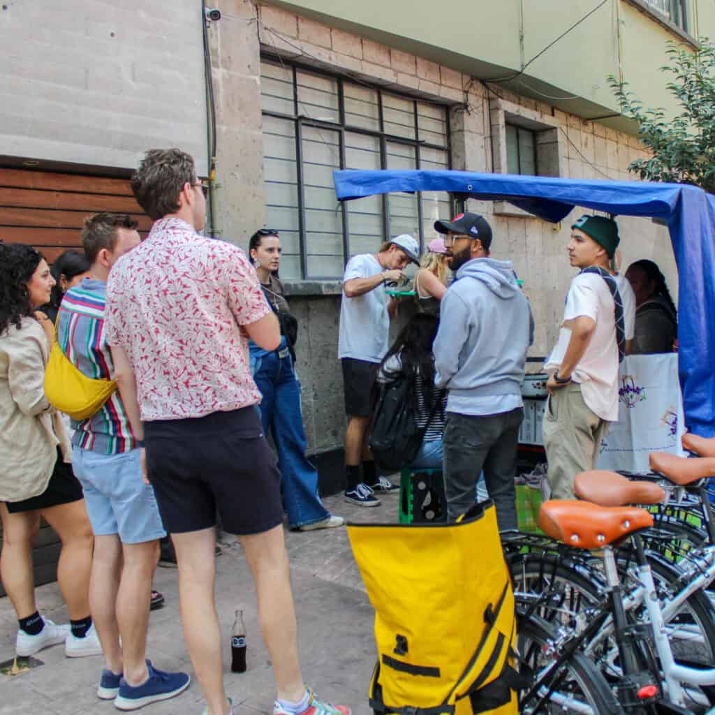 Group photo with bicycles in Condesa during the Food Hood Mexico tour.