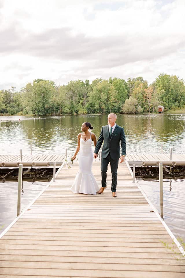 Elopement portrait on the Riverside Park dock in Carleton Place