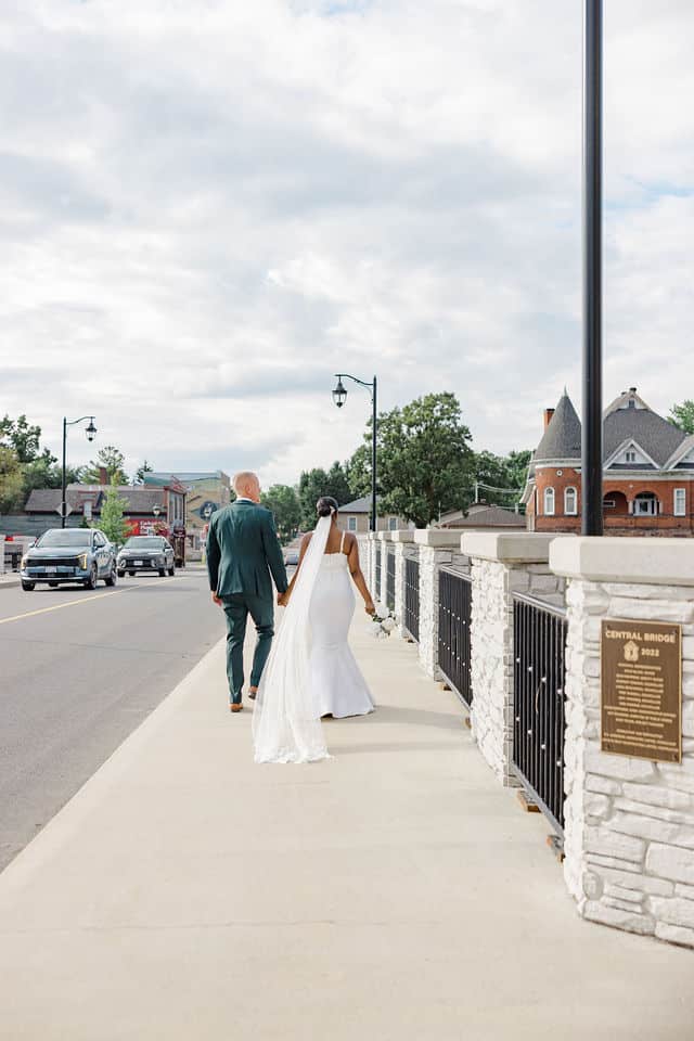 Bride and groom walking away after their Carleton Place elopement