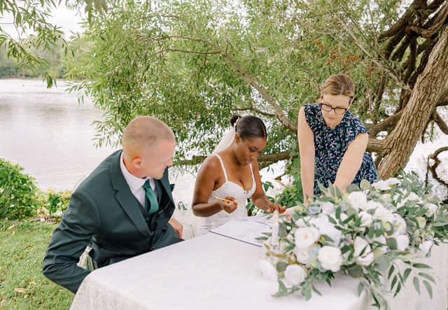 Signing the marriage paperwork after the Carleton Place ceremony