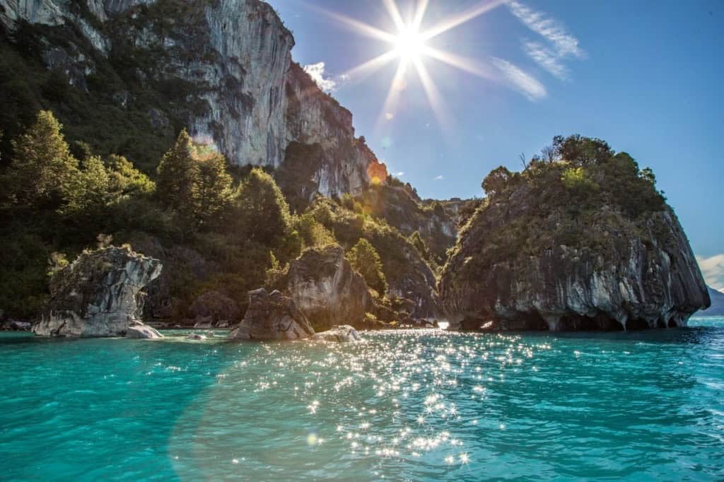 sun reflecting in the water at the Marble caves of Puerto Rio Tranquilo
