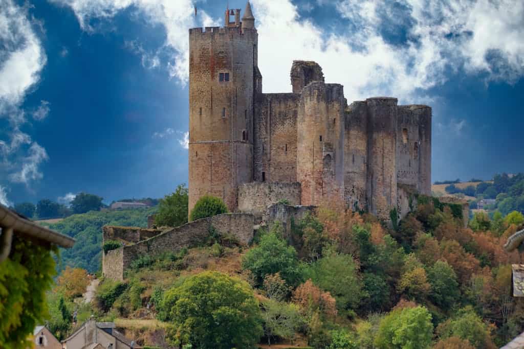 Brown Concrete Castle Under Blue Sky