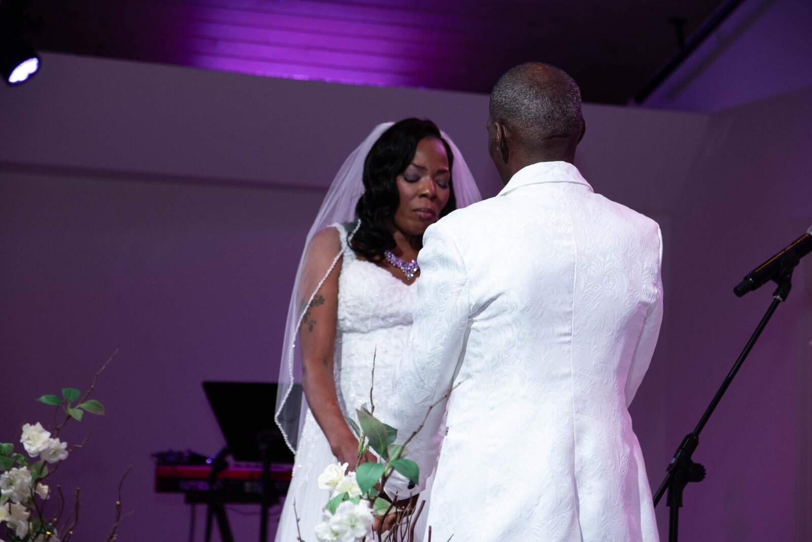 Beautiful moment of a bride and groom during their wedding vows.