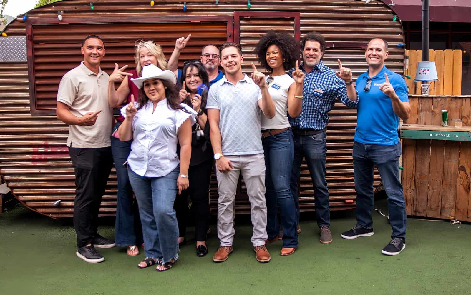 A joyful group of friends celebrating together outdoors, capturing a memorable moment.