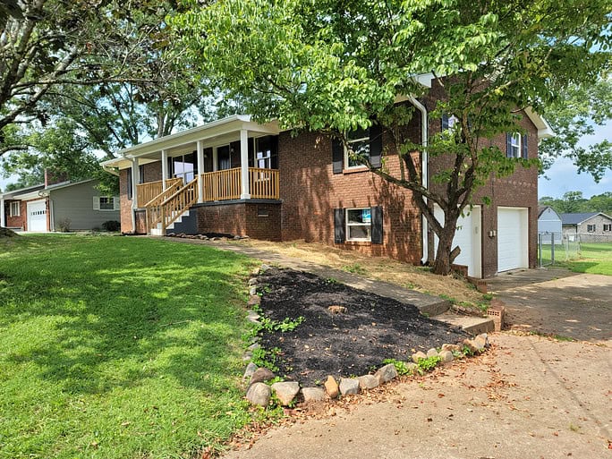 For sale A brick home on Temple Acres Drive in Knoxville with a large yard Speedy Turtle