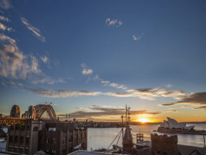 A stunning sunrise over the City on your Sydney Day Tour