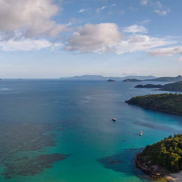 An aerial image of the Australian coastline and ocean