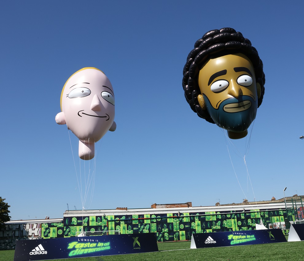 Giant floating Mo Salah and Vivianne Miedema heads appear over London