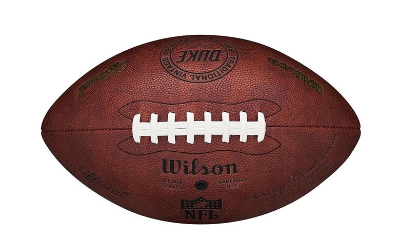 Premium Wilson NFL football for American football training and games, featuring durable construction, iconic branding, and official size for competitive play and sports enthusiasts.