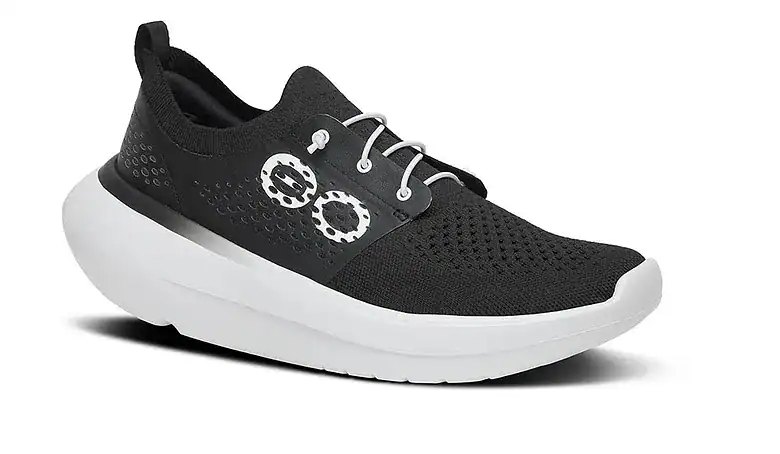 Black OOFOS Oomystride athletic shoe with breathable mesh upper and cushioned sole, ideal for recovery and active lifestyles.