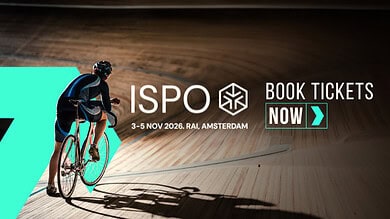 Cyclist racing on a velodrome track at the ISPO event in Amsterdam, November 2026, promoting sports events and ticket bookings for cycling enthusiasts and sports fans.