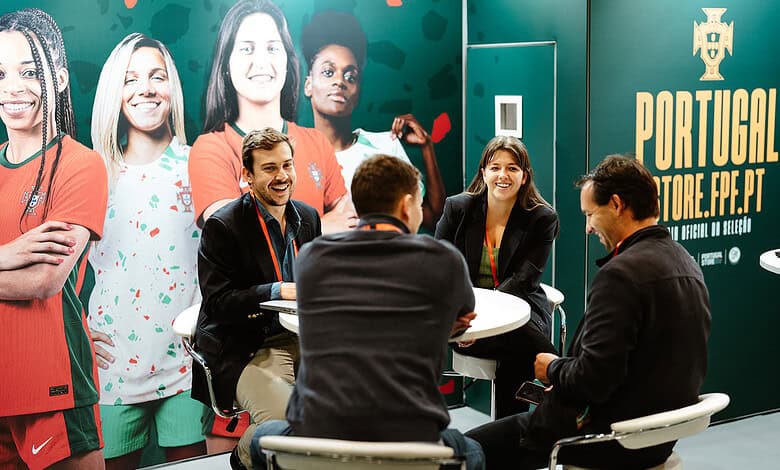 Group of diverse sports professionals and enthusiasts engaging in a discussion at Portugal Sports Insight event, promoting sports innovation and collaboration.