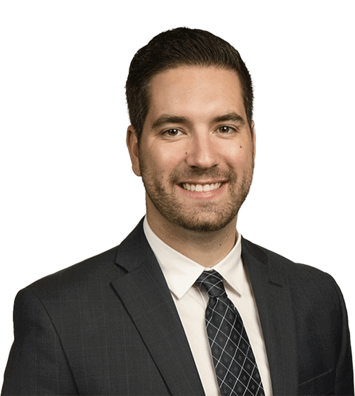 Professional business portrait of a confident man in a suit, representing consulting expertise.