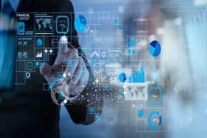 businessman hand working with modern technology and digital laye