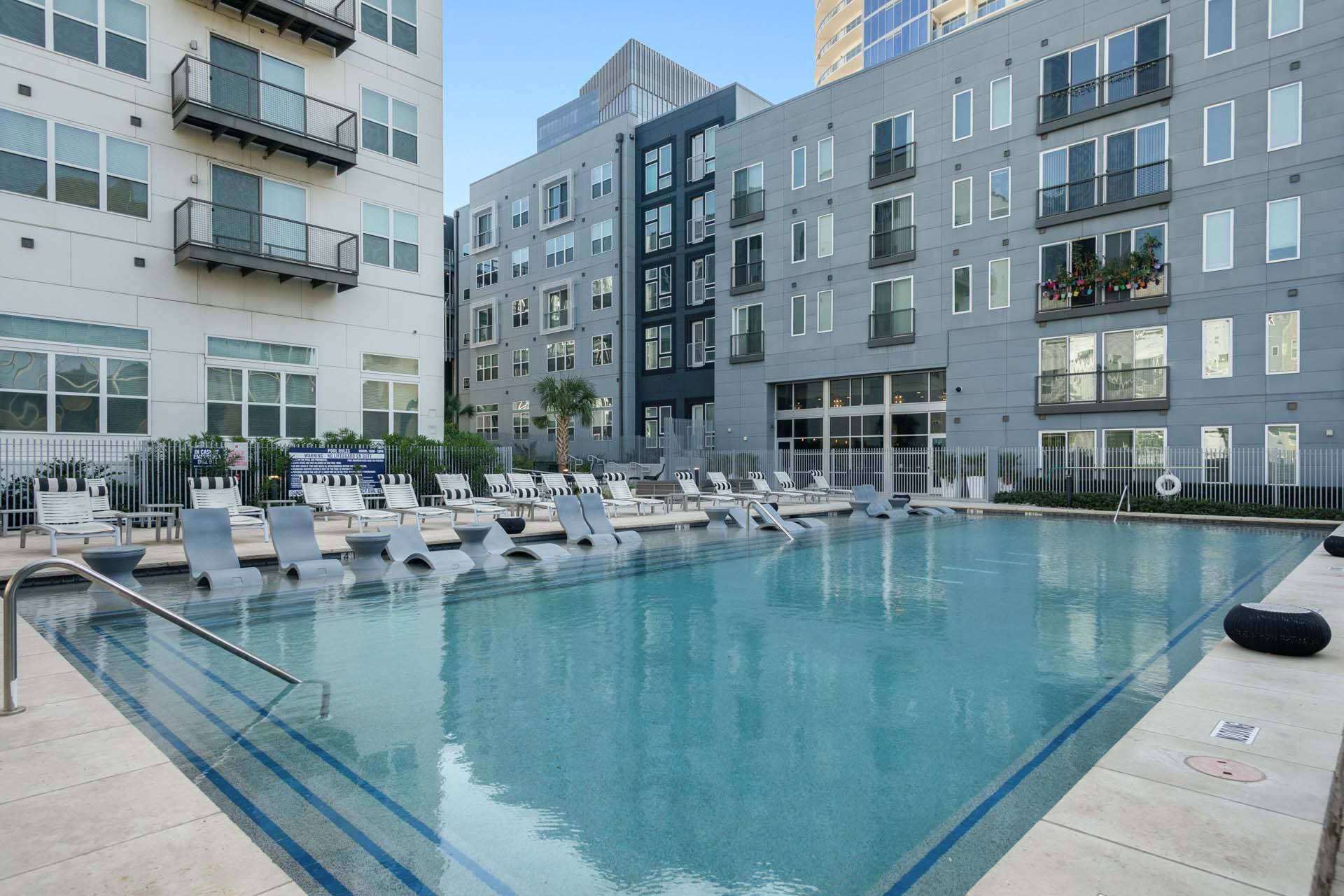 Resort-style swimming pool at Metro West, 75024, TX.